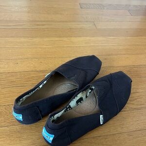 TOMS Classic Black Canvas Slip-Ons